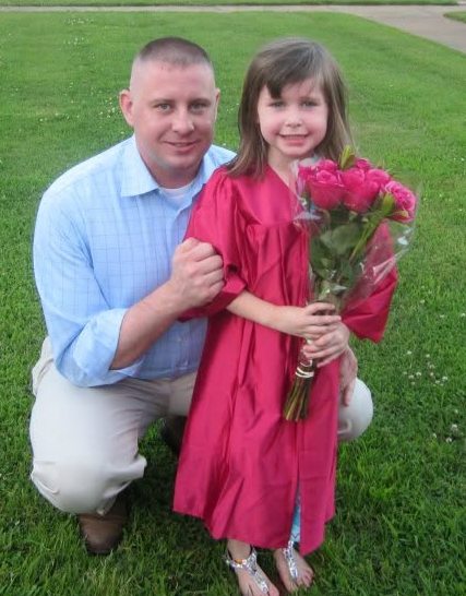 Will Fersner with a young girl